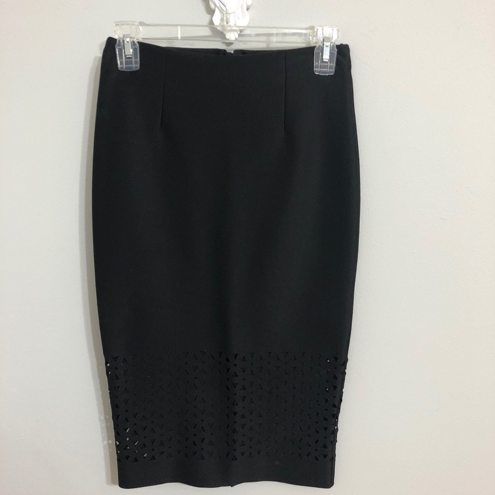 H&M black pencil skirt with perforated bottom.